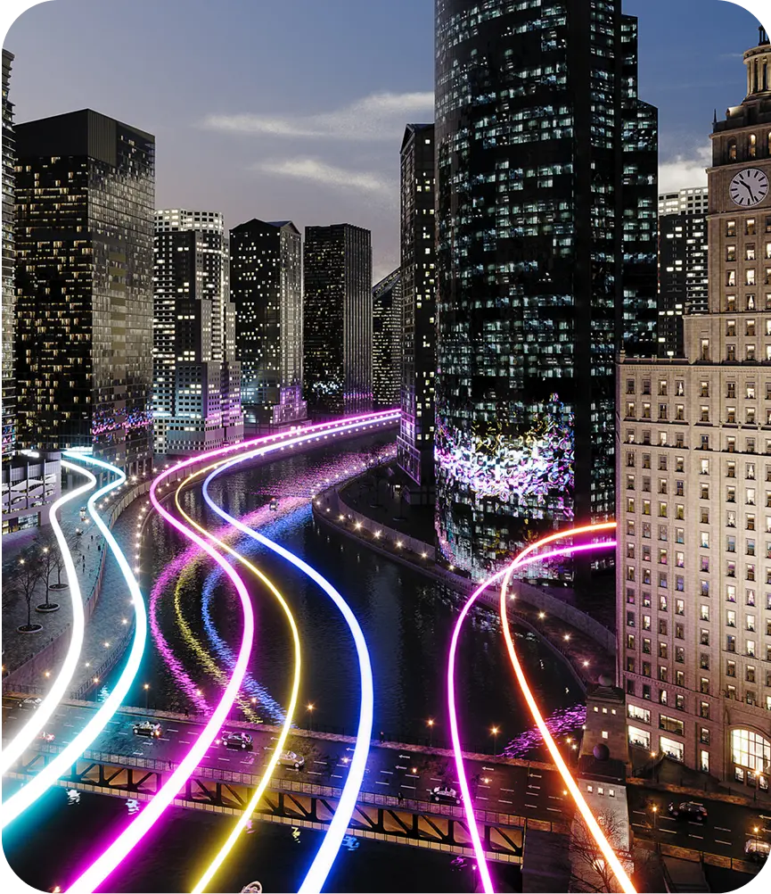 Cityscape with colorful light trails at night.